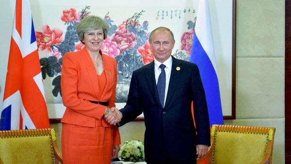 September 4, 2016. Russian President Vladimir Putin and British Prime Minister Theresa May during a meeting held as part of the G20 Summit in Hangzhou. - Sputnik International