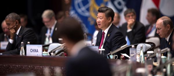 Chinese President Xi Jinping (C) makes a speech during the opening ceremony of the G20 Leaders Summit as US President Barack Obama (L) and Russia's President Vladimir Putin (R) listen in Hangzhou, Zhejiang province, China, September 4, 2016. - Sputnik International