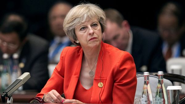 Britain's Prime Minister Theresa May listens to the speech of China's President Xi Jinping during the opening ceremony of the G20 Summit in Hangzhou, China, September 4, 2016. - Sputnik International