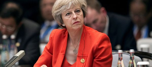 Britain's Prime Minister Theresa May listens to the speech of China's President Xi Jinping during the opening ceremony of the G20 Summit in Hangzhou, China, September 4, 2016. Britain's Prime Minister Theresa May listens to the speech of China's President Xi Jinping during the opening ceremony of the G20 Summit in Hangzhou, China, September 4, 2016. - Sputnik International