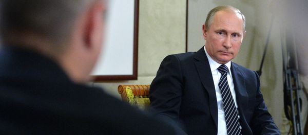 Russian President Vladimir Putin listens to a question during a press conference after the conclusion of the G-20 Summit in Hangzhou in eastern China's Zhejiang Province, Monday, Sept. 5, 2016 - Sputnik International