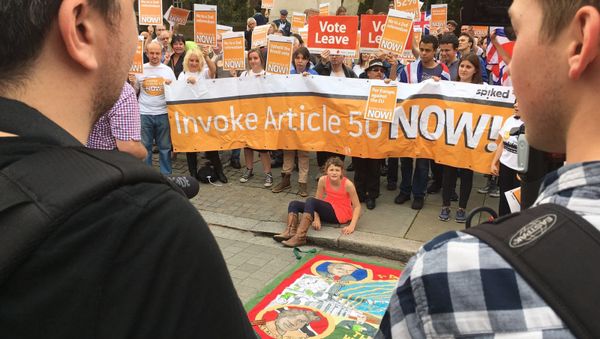 Protesters in London are calling on the government to invoke Article 50, initiating Britain’s exit from the European Union. Protesters in London are calling on the government to invoke Article 50, initiating Britain’s exit from the European Union. - Sputnik International