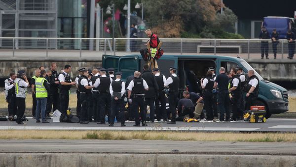 Emergency services surround protestors from the movement Black Lives Matter after they locked themselves to a tripod on the runway at London City Airport in London on September 6, 2016 Emergency services surround protestors from the movement Black Lives Matter after they locked themselves to a tripod on the runway at London City Airport in London on September 6, 2016 - Sputnik International