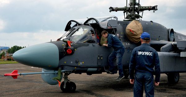 Mechanics work on a Ka-52K Katran helicopter at the Progress aviation plant in the Primorsky Territory. File photo Mechanics work on a Ka-52K Katran helicopter at the Progress aviation plant in the Primorsky Territory. File photo - Sputnik International