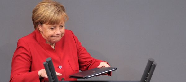German Chancellor Angela Merkel walks to the desk during a meeting at the lower house of parliament Bundestag on 2017 budget in Berlin, Germany, September 7, 2016 - Sputnik International