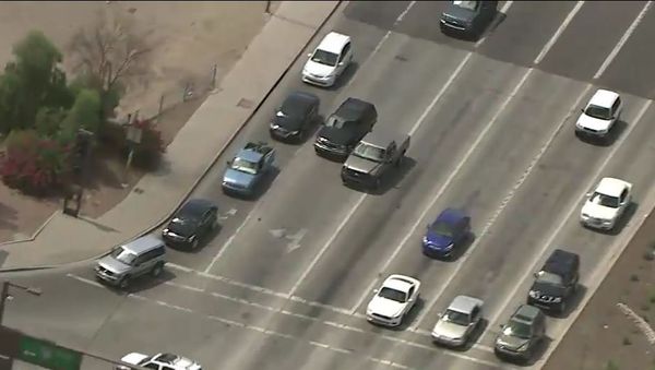 Police Chase in Phoenix, Arizona, captured by FOX 10 channel, that resulted in deadly shooting - Sputnik International