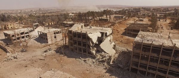 Destroyed buildings of the Syrian Air Force school in Aleppo, Syria - Sputnik International