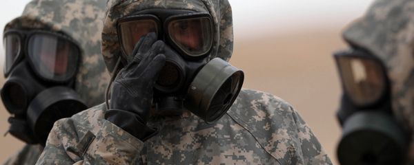 Soldiers wear mask sas they take part in a military exercise simulating a chemical weapons attack during the international Eager Lion military event on June 2, 2014 at Prince Hashem Bin Abdullah II training center, in Zarqa, 30 km east of Amman, Jordan Soldiers wear mask sas they take part in a military exercise simulating a chemical weapons attack during the international Eager Lion military event on June 2, 2014 at Prince Hashem Bin Abdullah II training center, in Zarqa, 30 km east of Amman, Jordan - Sputnik International