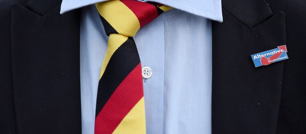 A man with a tie in German national colours wears a pin of the anti-immigrant Alternative for Deutschland (AfD) during the state election Mecklenburg-Vorpommern in Schwerin, Germany, September 4, 2016 A man with a tie in German national colours wears a pin of the anti-immigrant Alternative for Deutschland (AfD) during the state election Mecklenburg-Vorpommern in Schwerin, Germany, September 4, 2016 - Sputnik International