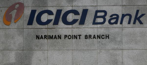 Pedestrians walking outside the ICICI bank in Mumbai, India. (File) Pedestrians walking outside the ICICI bank in Mumbai, India. (File) - Sputnik International