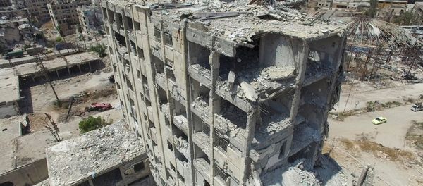 A destroyed building in the Bani Zeid district in north Aleppo. (File) A destroyed building in the Bani Zeid district in north Aleppo. (File) - Sputnik International