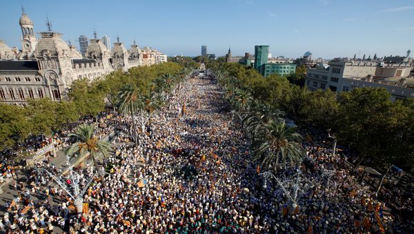 People hold Catalan separatist flags known as Esteladas during a gathering to mark the Catalonia day Diada in central Barcelona, Spain, September 11, 2016. People hold Catalan separatist flags known as Esteladas during a gathering to mark the Catalonia day Diada in central Barcelona, Spain, September 11, 2016. - Sputnik International