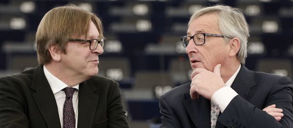 EU Commission chief Jean-Claude Juncker (R) speaks with Alliance of liberals and Democrats for Europe (ALDE) group leader and Belgian member of the European Parliament Guy Verhofstadt prior to a debate on the outgoing Italian Presidency of the Council of the European Union, at the European Parliament on January 13, 2015 in Strasbourg, eastern France. - Sputnik International