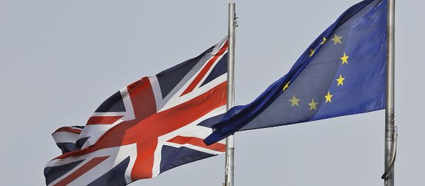 A Union Jack flag and a European flag blow in the wind in front of the city hall in London. (File) A Union Jack flag and a European flag blow in the wind in front of the city hall in London. (File) - Sputnik International