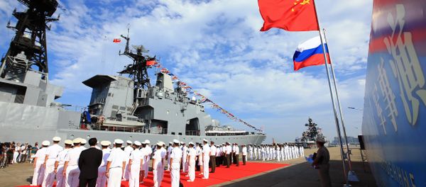 Officers and soldiers of China's People's Liberation Army (PLA) Navy hold a welcome ceremony as a Russian naval ship arrives in port in Zhanjiang in southern China's Guangdong Province Officers and soldiers of China's People's Liberation Army (PLA) Navy hold a welcome ceremony as a Russian naval ship arrives in port in Zhanjiang in southern China's Guangdong Province - Sputnik International