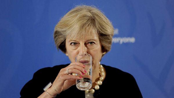 Prime Minister Theresa May takes a drink as she delivers a speech at the British Academy in London, where she said that a new wave of grammar schools will end selection by house price and give every child the chance to go to a good school, in Britain September 9, 2016 Prime Minister Theresa May takes a drink as she delivers a speech at the British Academy in London, where she said that a new wave of grammar schools will end selection by house price and give every child the chance to go to a good school, in Britain September 9, 2016 - Sputnik International