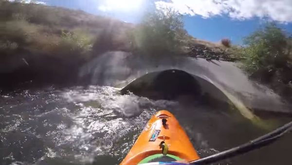 Kayaking Through a Drain Pipe - Sputnik International