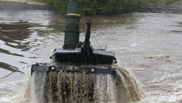 A main battle tank 'Leopard 2 A6' is going out a pond during an exercise of the German army on the training area in Munster, Germany, Monday, June 15, 2009 - Sputnik International