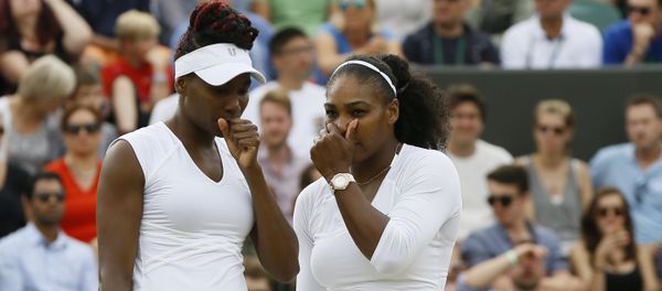 Serena Williams, right with her sister and playing partner Venus Williams of the US talks as they play against Elena Vesnina of Russia and Ekaterina Makarova of Russia during their women's doubles tennis match on eleven day of the Wimbledon Tennis Championships in London, Thursday, July 7, 2016 Serena Williams, right with her sister and playing partner Venus Williams of the US talks as they play against Elena Vesnina of Russia and Ekaterina Makarova of Russia during their women's doubles tennis match on eleven day of the Wimbledon Tennis Championships in London, Thursday, July 7, 2016 - Sputnik International
