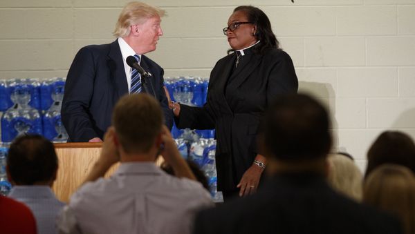 Rev. Faith Green Timmons interrupts Republican presidential candidate Donald Trump. - Sputnik International