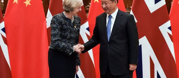 Chinese President Xi Jinping (R) shakes hand with British Prime Minister Theresa May before their meeting at the West Lake State House on the sidelines of the G20 Summit, in Hangzhou, Zhejiang province, China, September 5, 2016. Chinese President Xi Jinping (R) shakes hand with British Prime Minister Theresa May before their meeting at the West Lake State House on the sidelines of the G20 Summit, in Hangzhou, Zhejiang province, China, September 5, 2016. - Sputnik International