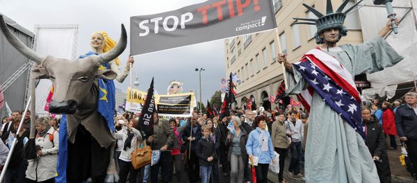 Consumer rights activists take part in a march to protest against the Transatlantic Trade and Investment Partnership (TTIP) and Comprehensive Economic and Trade Agreement (CETA) in Berlin, Germany Consumer rights activists take part in a march to protest against the Transatlantic Trade and Investment Partnership (TTIP) and Comprehensive Economic and Trade Agreement (CETA) in Berlin, Germany - Sputnik International