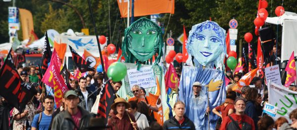 Rights activists take part in a march to protest against the Transatlantic Trade and Investment Partnership (TTIP) and Comprehensive Economic and Trade Agreement (CETA) in Berlin, Germany Rights activists take part in a march to protest against the Transatlantic Trade and Investment Partnership (TTIP) and Comprehensive Economic and Trade Agreement (CETA) in Berlin, Germany - Sputnik International