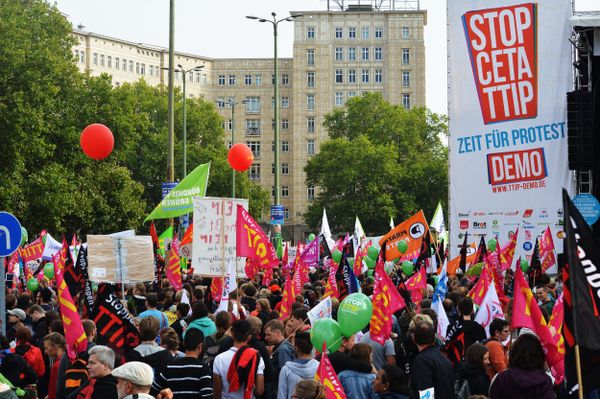 Rights activists take part in a march to protest against the Transatlantic Trade and Investment Partnership (TTIP) and Comprehensive Economic and Trade Agreement (CETA) in Berlin, Germany Rights activists take part in a march to protest against the Transatlantic Trade and Investment Partnership (TTIP) and Comprehensive Economic and Trade Agreement (CETA) in Berlin, Germany - Sputnik International