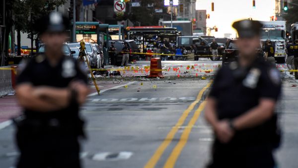 New York City Police Department (NYPD) officers stand near the site of an explosion in the Chelsea neighborhood of Manhattan, New York, U.S New York City Police Department (NYPD) officers stand near the site of an explosion in the Chelsea neighborhood of Manhattan, New York, U.S - Sputnik International