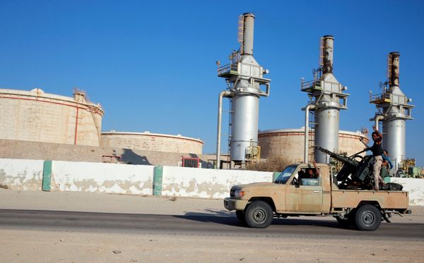 Libyan forces loyal to eastern commander Khalifa Haftar ride a pickup truck at the Zueitina oil terminal in Zueitina, west of Benghazi, Libya. file photo  - Sputnik International