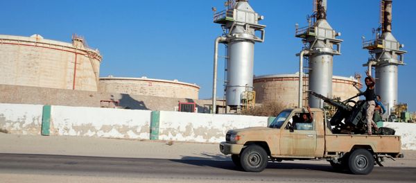 Libyan forces loyal to eastern commander Khalifa Haftar ride a pickup truck at the Zueitina oil terminal in Zueitina, west of Benghazi, Libya - Sputnik International