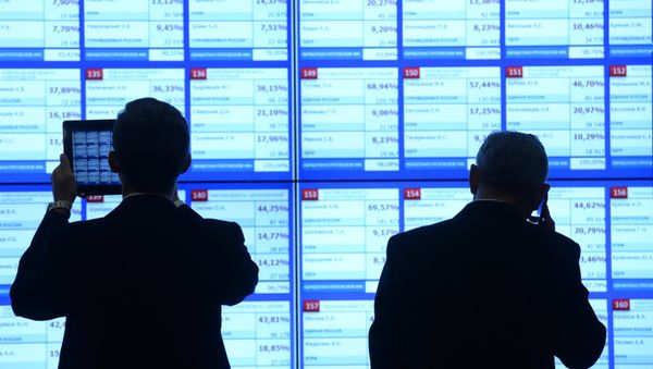 Early results of the Russian State Duma election in single-member constituencies on information screens at the Russian Central Election Commission. - Sputnik International