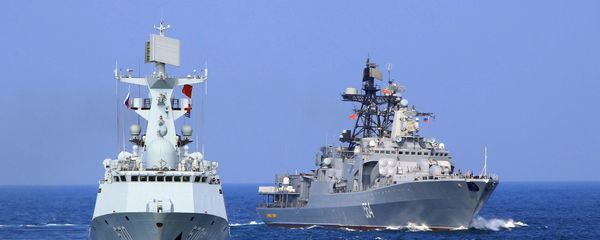 In this Friday, Sept. 16, 2016 photo released by Xinhua News Agency, Chinese Navy frigate Huangshan, left, and Russian Navy antisubmarine ship Admiral Tributs take part in a joint naval drill at sea off south China's Guangdong Province. In this Friday, Sept. 16, 2016 photo released by Xinhua News Agency, Chinese Navy frigate Huangshan, left, and Russian Navy antisubmarine ship Admiral Tributs take part in a joint naval drill at sea off south China's Guangdong Province. - Sputnik International