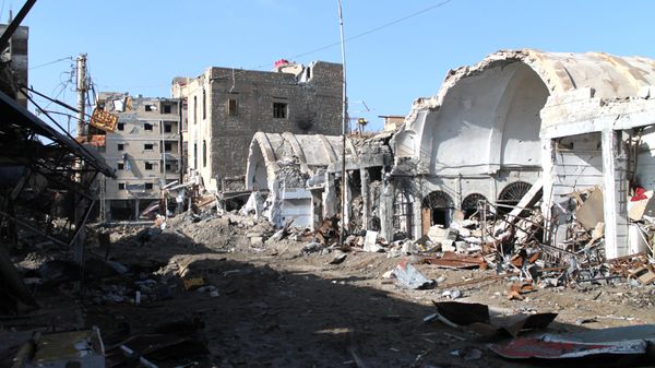 Destroyed buildings making up the souk or market in the old sector of the eastern city of Deir Ezzor, which lies in the eastern province of the same name Destroyed buildings making up the souk or market in the old sector of the eastern city of Deir Ezzor, which lies in the eastern province of the same name - Sputnik International