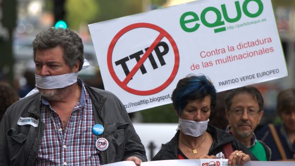Protesters take part in demonstration against Transatlantic Trade and Investment Partnership (TTIP) in Madrid. (File) Protesters take part in demonstration against Transatlantic Trade and Investment Partnership (TTIP) in Madrid. (File) - Sputnik International