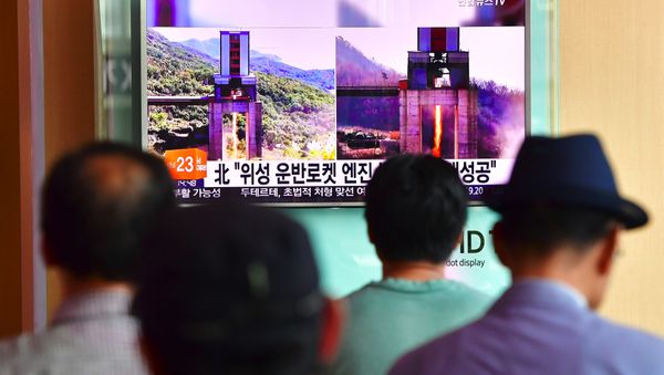 People watch a television news report about North Korea's latest ground test for a rocket engine, at a railway station in Seoul on September 20, 2016 People watch a television news report about North Korea's latest ground test for a rocket engine, at a railway station in Seoul on September 20, 2016 - Sputnik International