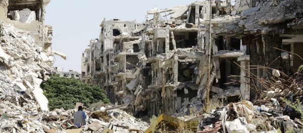 A general view shows destroyed buildings in the government-held Jouret al-Shiah neighbourhood of the central Syrian city of Homs on September 19, 2016 - Sputnik International