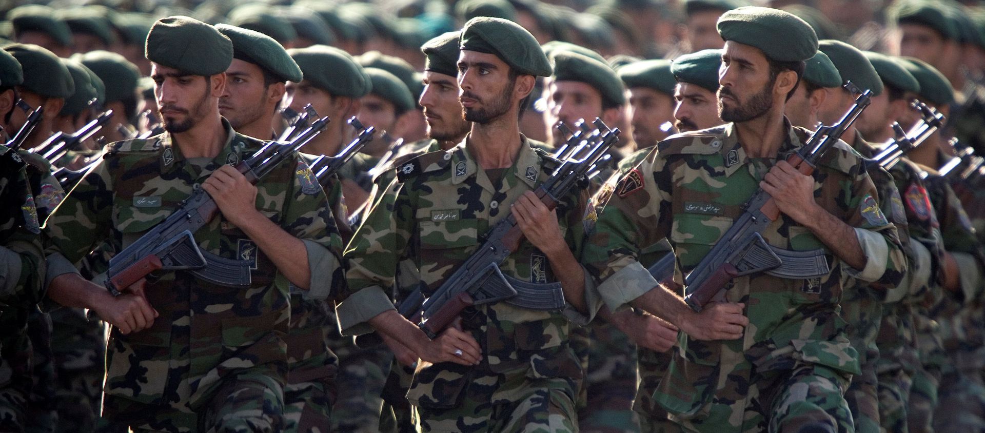 Members of Iran's Revolutionary Guards march during a military parade to commemorate the 1980-88 Iran-Iraq war in Tehran. Members of Iran's Revolutionary Guards march during a military parade to commemorate the 1980-88 Iran-Iraq war in Tehran. - Sputnik International, 1920, 27.04.2021