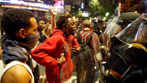 A man speaks to police in uptown Charlotte, NC during a protest of the police shooting of Keith Scott, in Charlotte, North Carolina, U.S. September 21, 2016 A man speaks to police in uptown Charlotte, NC during a protest of the police shooting of Keith Scott, in Charlotte, North Carolina, U.S. September 21, 2016 - Sputnik International