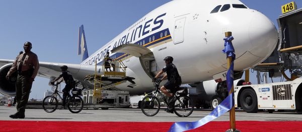 A Singapore Airlines Airbus 380 is parked behind a red carpet and stantion holding the ceremonial ribbon that was cut at the grand opening of the Tom Bradley International Terminal at Los Angeles International Airport. File photo A Singapore Airlines Airbus 380 is parked behind a red carpet and stantion holding the ceremonial ribbon that was cut at the grand opening of the Tom Bradley International Terminal at Los Angeles International Airport. File photo - Sputnik International