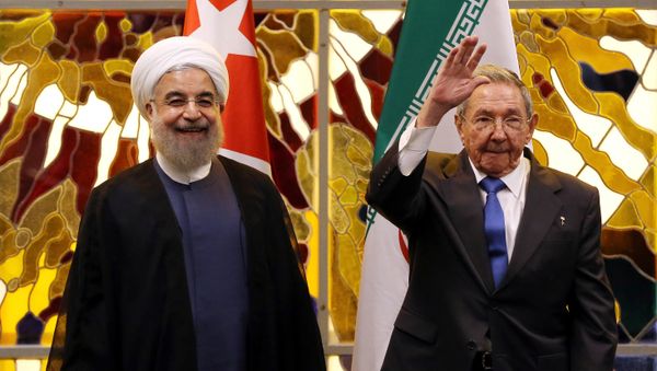 Iran's President Hassan Rouhani (L) and Cuba's President Raul Castro react during a ceremony at the Palace of the Revolution in Havana, Cuba, September 19, 2016 Iran's President Hassan Rouhani (L) and Cuba's President Raul Castro react during a ceremony at the Palace of the Revolution in Havana, Cuba, September 19, 2016 - Sputnik International
