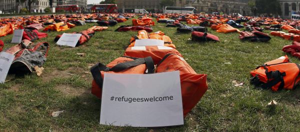 A display of lifejackets worn by refugees during their crossing from Turkey to the Greek island of Chois, are seen Parliament Square in central London, Britain September 19, 2016 A display of lifejackets worn by refugees during their crossing from Turkey to the Greek island of Chois, are seen Parliament Square in central London, Britain September 19, 2016 - Sputnik International