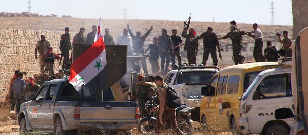 Syrian government forces celebrate in the largely deserted Palestinian refugee camp of Handarat, north of Aleppo, on September 24, 2016 Syrian government forces celebrate in the largely deserted Palestinian refugee camp of Handarat, north of Aleppo, on September 24, 2016 - Sputnik International