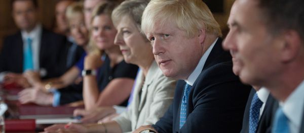 British Foreign Secretary Boris Johnson (2R) sits next to British Prime Minister Theresa May (3R) during a meeting of the cabinet at the Prime Minister's country retreat Chequers near the village of Ellesborough in Buckinghamshire, northwest of London, on August 31, 2016. British Foreign Secretary Boris Johnson (2R) sits next to British Prime Minister Theresa May (3R) during a meeting of the cabinet at the Prime Minister's country retreat Chequers near the village of Ellesborough in Buckinghamshire, northwest of London, on August 31, 2016. - Sputnik International