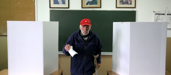 A man votes during a referendum on Statehood Day in Laktasi near Banja Luka, Bosnia and Herzegovina, September 25, 2016. A man votes during a referendum on Statehood Day in Laktasi near Banja Luka, Bosnia and Herzegovina, September 25, 2016. - Sputnik International