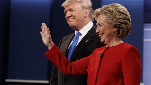 Republican presidential candidate Donald Trump, left, stands with Democratic presidential candidate Hillary Clinton before the first presidential debate at Hofstra University, Monday, Sept. 26, 2016, in Hempstead, N.Y. Republican presidential candidate Donald Trump, left, stands with Democratic presidential candidate Hillary Clinton before the first presidential debate at Hofstra University, Monday, Sept. 26, 2016, in Hempstead, N.Y. - Sputnik International