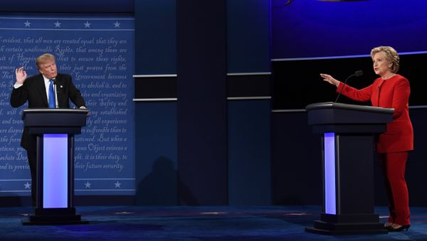 Republican nominee Donald Trump (L) looks on as Democratic nominee Hillary Clinton speaks during the first presidential debate at Hofstra University in Hempstead, New York Republican nominee Donald Trump (L) looks on as Democratic nominee Hillary Clinton speaks during the first presidential debate at Hofstra University in Hempstead, New York - Sputnik International