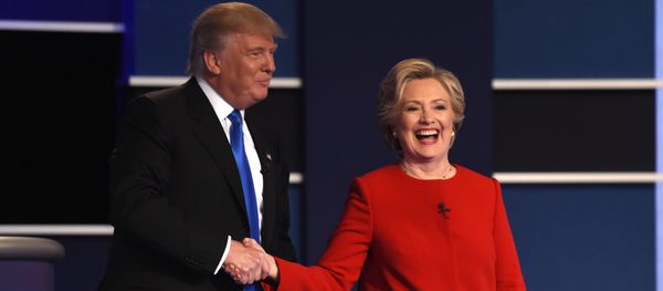 Democratic nominee Hillary Clinton (R) shakes hands with Republican nominee Donald Trump after the first presidential debate at Hofstra University in Hempstead, New York Democratic nominee Hillary Clinton (R) shakes hands with Republican nominee Donald Trump after the first presidential debate at Hofstra University in Hempstead, New York - Sputnik International
