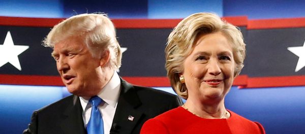 Republican US presidential nominee Donald Trump and Democratic U.S. presidential nominee Hillary Clinton greet one another as they take the stage for their first debate at Hofstra University in Hempstead, New York, U.S. September 26, 2016. Republican US presidential nominee Donald Trump and Democratic U.S. presidential nominee Hillary Clinton greet one another as they take the stage for their first debate at Hofstra University in Hempstead, New York, U.S. September 26, 2016. - Sputnik International