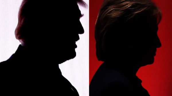 This combination of file photos shows the silhouettes of Republican presidential nominee Donald Trump(R) July 18, 2016 and Democratic presidential nominee Hillary Clinton on February 4, 2016. This combination of file photos shows the silhouettes of Republican presidential nominee Donald Trump(R) July 18, 2016 and Democratic presidential nominee Hillary Clinton on February 4, 2016. - Sputnik International